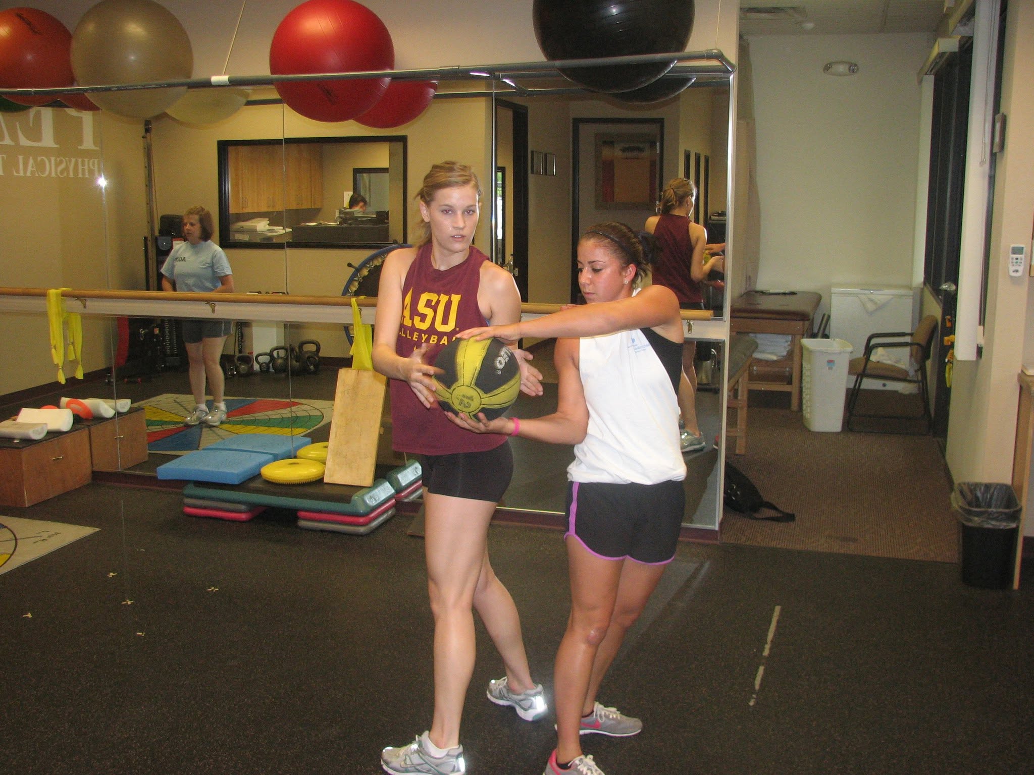 Partner medicine-ball rotation work.